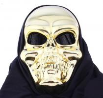 Золотистая маска улыбающегося черепа